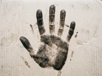 Official Black Hand Automotive black handprint on textured ivory